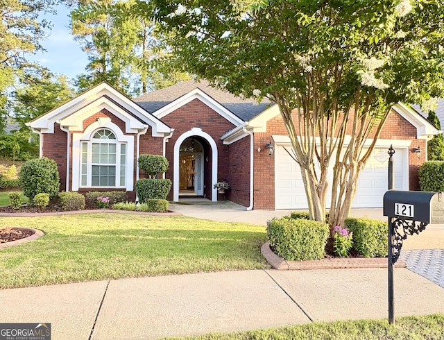 121 Pinnacle Ln, Mcdonough, GA 30253 - ranch-style home featuring an attached garage, brick siding, a front lawn, and driveway