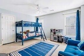380 Victorian Ln, Duluth, GA 30097 - bedroom featuring multiple windows and ceiling fan