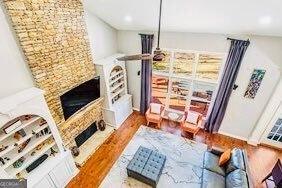 380 Victorian Ln, Duluth, GA 30097 - living room with a fireplace, wood finished floors, and recessed lighting