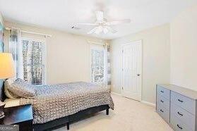380 Victorian Ln, Duluth, GA 30097 - bedroom with light colored carpet and ceiling fan