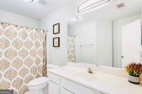 380 Victorian Ln, Duluth, GA 30097 - bathroom featuring vanity and a shower with curtain