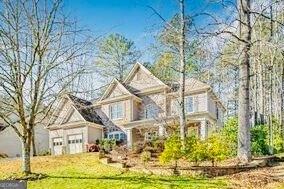 380 Victorian Ln, Duluth, GA 30097 - traditional home featuring a garage and a front lawn