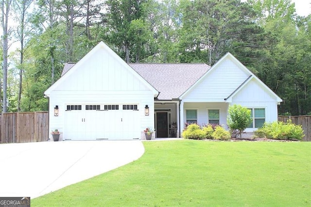 688 Harmony Rd, Temple, GA 30179 - view of front of house with board and batten siding, roof with shingles, an attached garage, and driveway