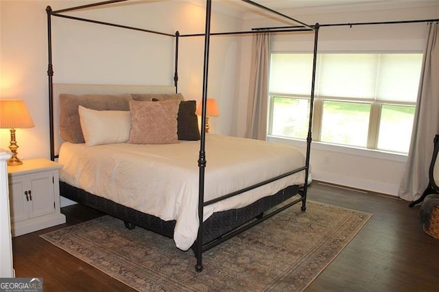 688 Harmony Rd, Temple, GA 30179 - bedroom featuring dark wood finished floors and baseboards