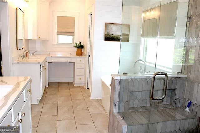 688 Harmony Rd, Temple, GA 30179 - bathroom with two vanities, a bathtub, a stall shower, and tile patterned flooring