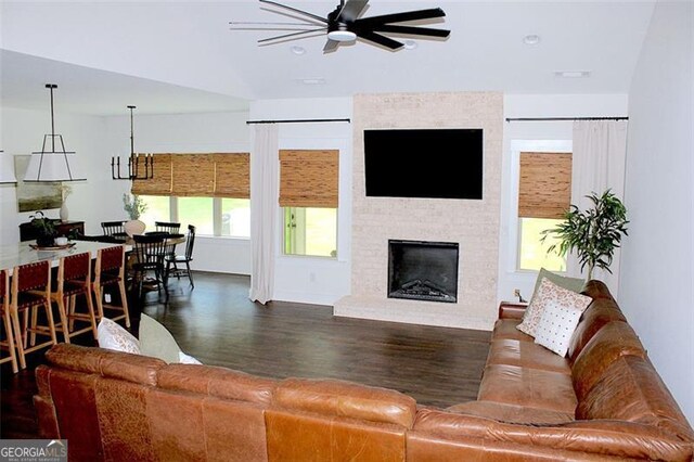 688 Harmony Rd, Temple, GA 30179 - living area with dark wood finished floors, a ceiling fan, a fireplace, and recessed lighting