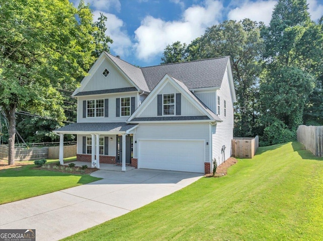 5195 Oaks Landing Ct, Sugar Hill, GA 30518 - view of front facade featuring driveway, a porch, a garage, brick siding, and a shingled roof