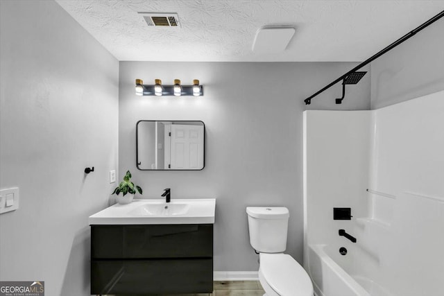 5195 Oaks Landing Ct, Sugar Hill, GA 30518 - full bathroom with vanity, shower / bathtub combination, and a textured ceiling