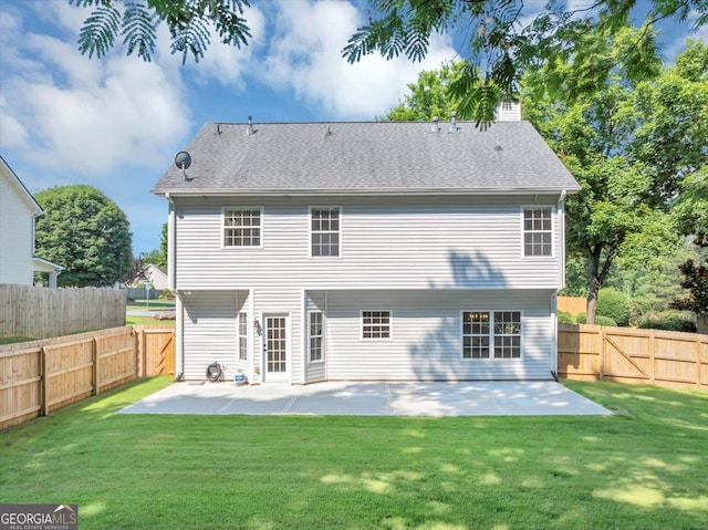 5195 Oaks Landing Ct, Sugar Hill, GA 30518 - rear view of property with a patio, a fenced backyard, and a chimney