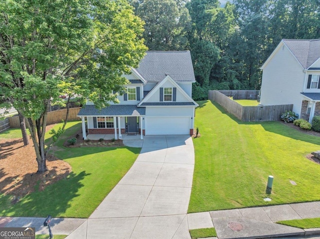 5195 Oaks Landing Ct, Sugar Hill, GA 30518 - traditional-style house with driveway, a porch, a garage, and a shingled roof