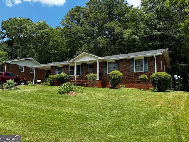 2933 Arlington Rd, East Point, GA 30344 - single story home with a front yard and brick siding