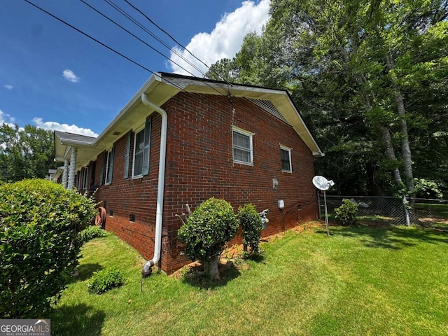 2933 Arlington Rd, East Point, GA 30344 - view of property exterior with brick siding and crawl space