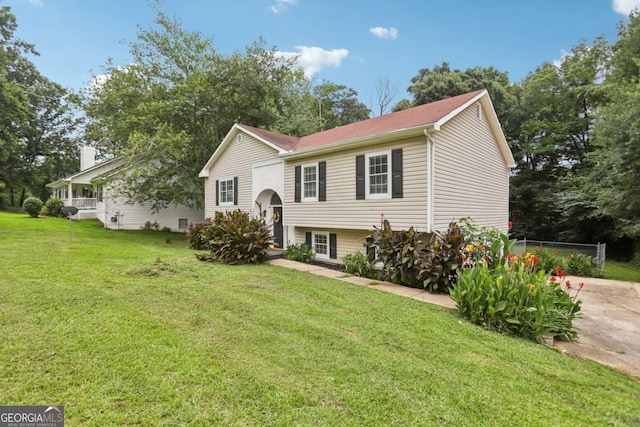 73 Azalea Dr, Villa Rica, GA 30180 - bi-level home with a front lawn