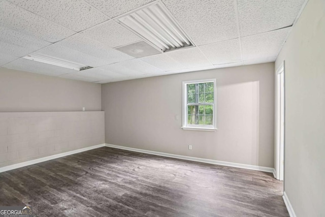 73 Azalea Dr, Villa Rica, GA 30180 - unfurnished room featuring wood finished floors and a paneled ceiling