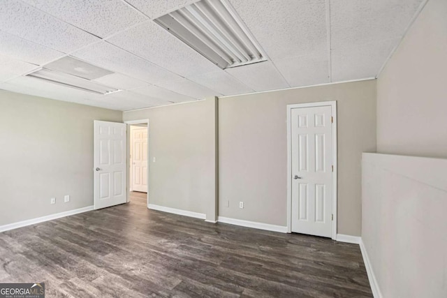 73 Azalea Dr, Villa Rica, GA 30180 - spare room with wood finished floors and a drop ceiling