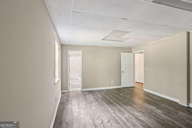 73 Azalea Dr, Villa Rica, GA 30180 - unfurnished room with wood finished floors and a paneled ceiling