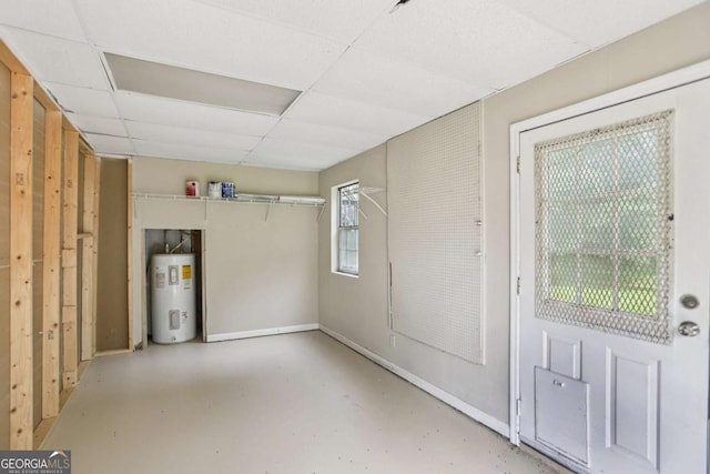 73 Azalea Dr, Villa Rica, GA 30180 - basement featuring electric water heater and a drop ceiling