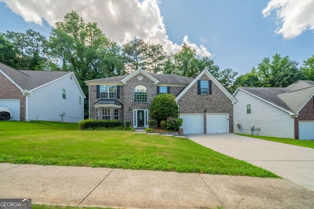 4815 Price St, Forest Park, GA 30297 - view of front of home featuring a front yard, concrete driveway, and a garage