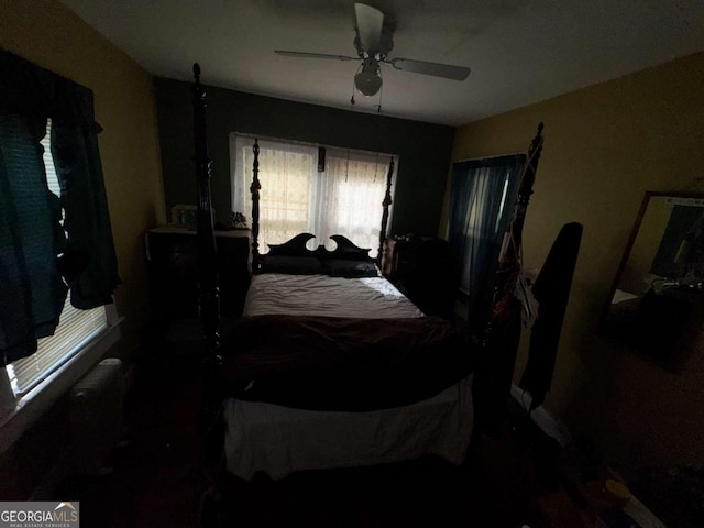 6733 Old Covington Rd, Lithonia, GA 30058 - bedroom featuring a ceiling fan and baseboards