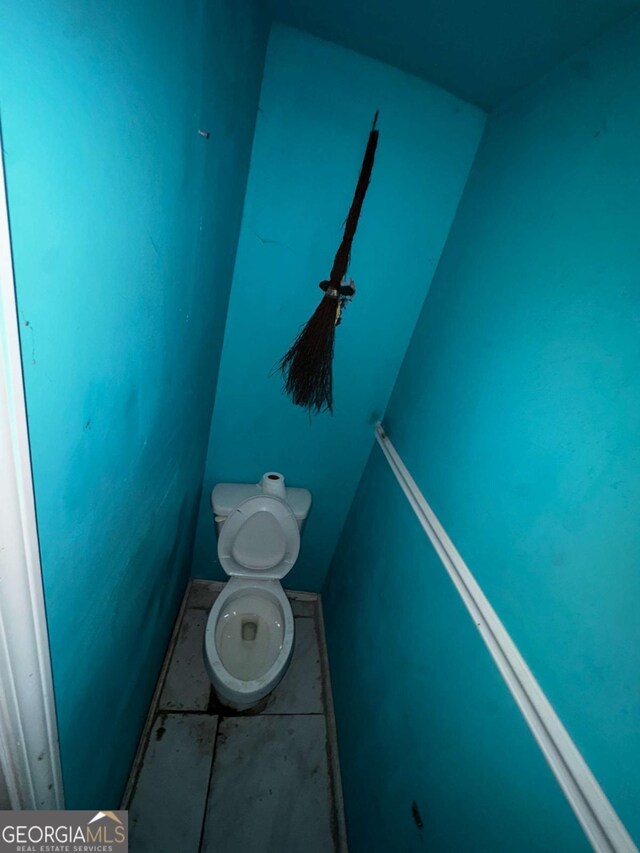6733 Old Covington Rd, Lithonia, GA 30058 - bathroom featuring toilet