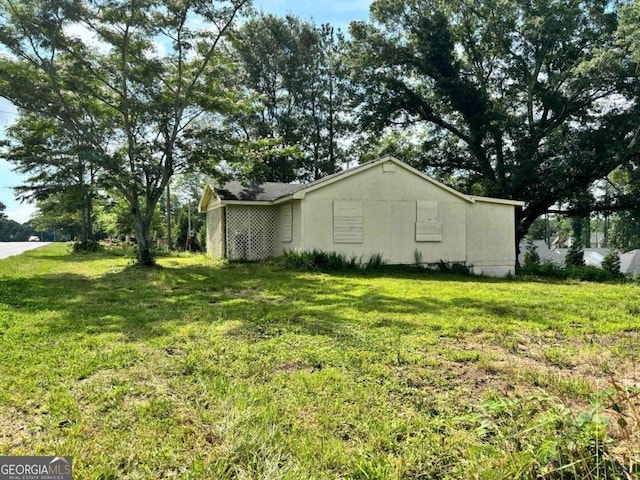 1891 Bennett Rd, Grayson, GA 30017 - view of side of home with a lawn