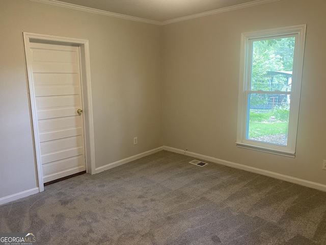 212 Rockmart Rd, Villa Rica, GA 30180 - empty room with dark carpet, plenty of natural light, and crown molding