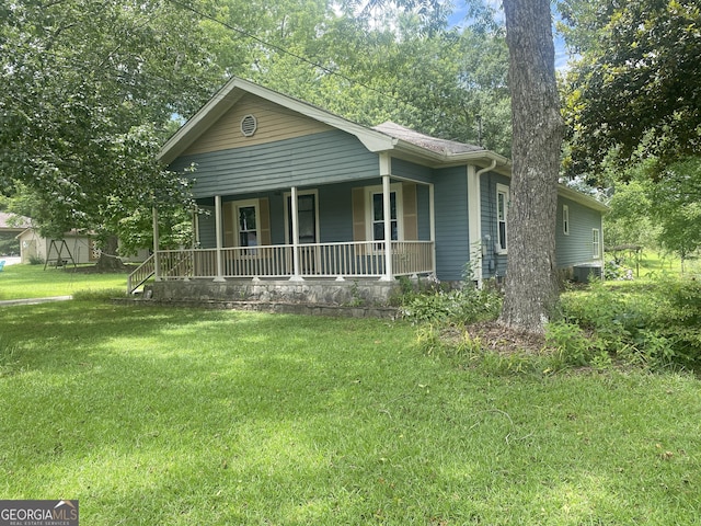 212 Rockmart Rd, Villa Rica, GA 30180 - view of front facade with a porch and a front yard