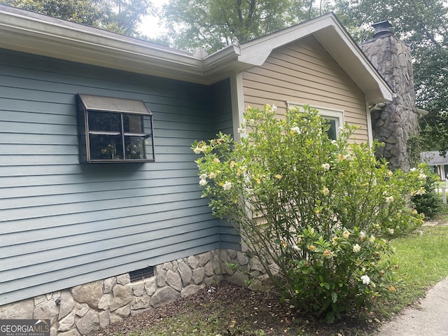 212 Rockmart Rd, Villa Rica, GA 30180 - view of side of home with a chimney