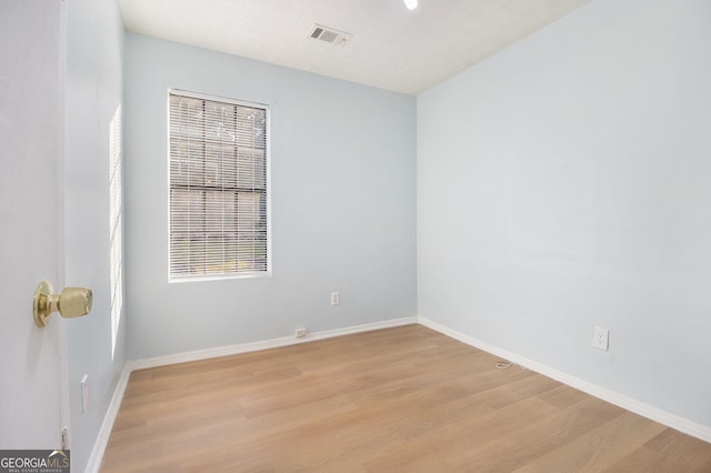 1077 Mainstreet Valley Dr, Stone Mountain, GA 30088 - spare room with light wood finished floors and baseboards