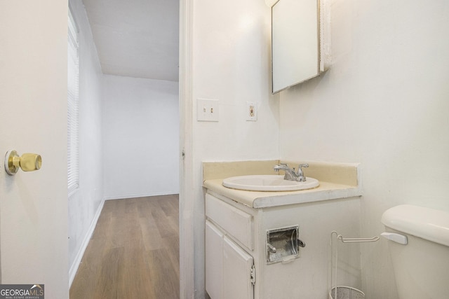 1077 Mainstreet Valley Dr, Stone Mountain, GA 30088 - bathroom featuring vanity and wood finished floors