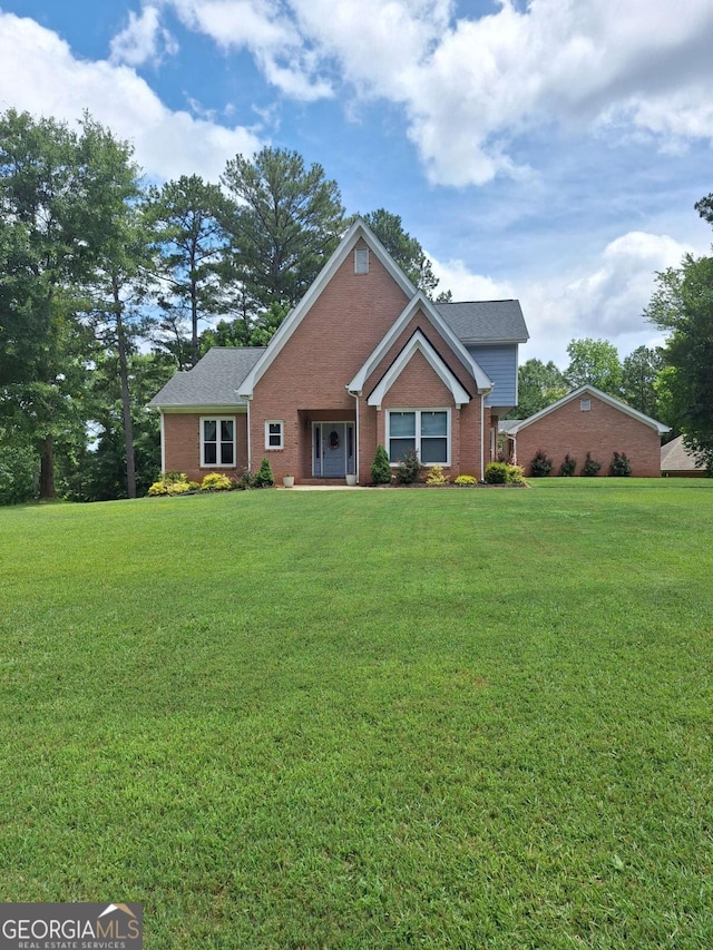 3612 Sierra Dr, Stockbridge, GA 30281 - ranch-style home with brick siding and a front yard