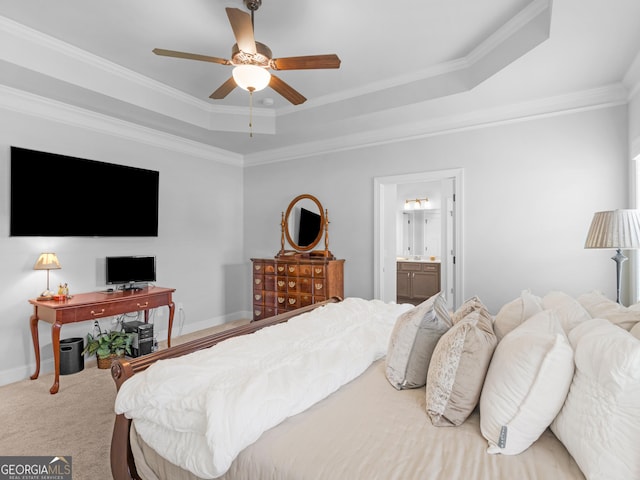 401 Mountain Dr, Monroe, GA 30655 - bedroom with a tray ceiling, carpet flooring, crown molding, connected bathroom, and a ceiling fan