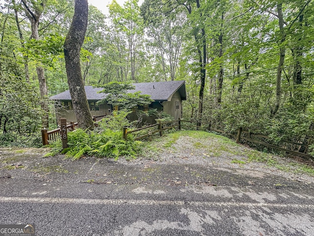 278 W Sugarbush Dr, Dillard, GA 30537 - view of front of home with a shingled roof and a view of trees