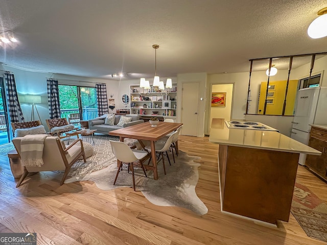 278 W Sugarbush Dr, Dillard, GA 30537 - living area with wood finished floors, plenty of natural light, and crown molding
