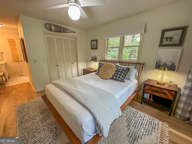 278 W Sugarbush Dr, Dillard, GA 30537 - bedroom featuring light wood finished floors, a closet, and ceiling fan