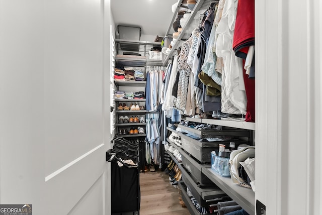 306 Clarendon Ct SE, Gainesville, GA 30501 - spacious closet featuring wood finished floors