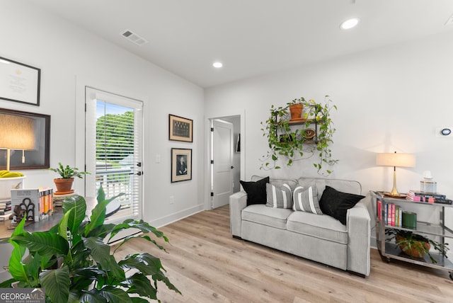 306 Clarendon Ct SE, Gainesville, GA 30501 - living area with light wood-style flooring and recessed lighting
