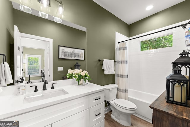 306 Clarendon Ct SE, Gainesville, GA 30501 - bathroom with vanity, wood finished floors, shower / tub combo, and recessed lighting