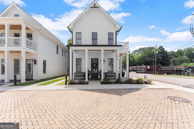 306 Clarendon Ct SE, Gainesville, GA 30501 - view of front of property featuring a porch and a balcony