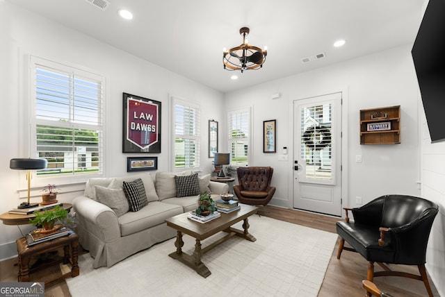 306 Clarendon Ct SE, Gainesville, GA 30501 - living room featuring a chandelier, wood finished floors, and recessed lighting