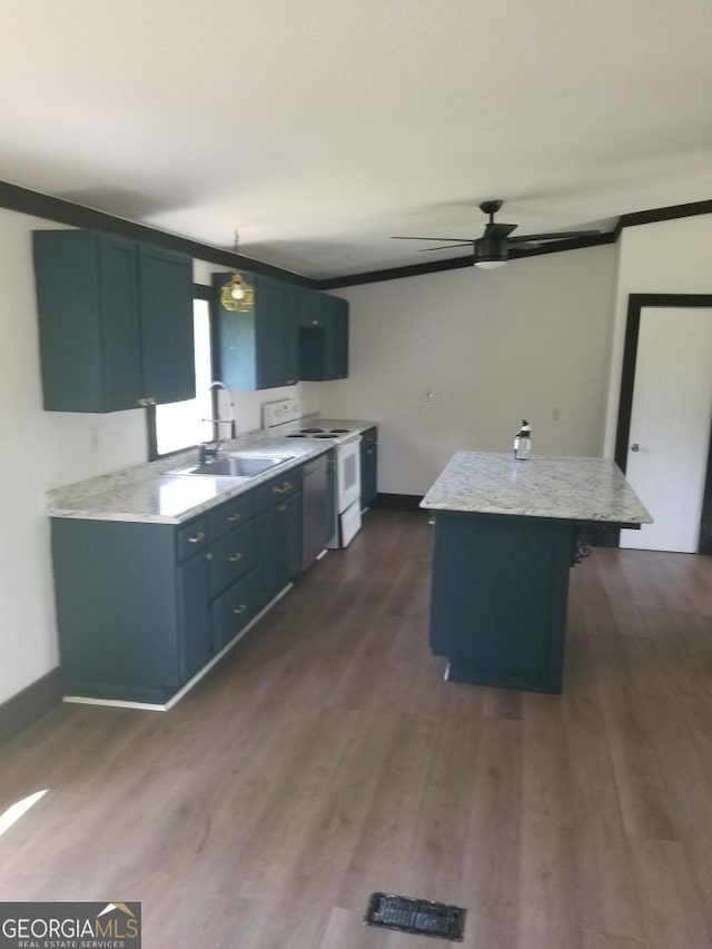 243 Gray Hill Rd, West Point, GA 31833 - kitchen with electric stove, light countertops, dark wood finished floors, a center island, and dishwasher