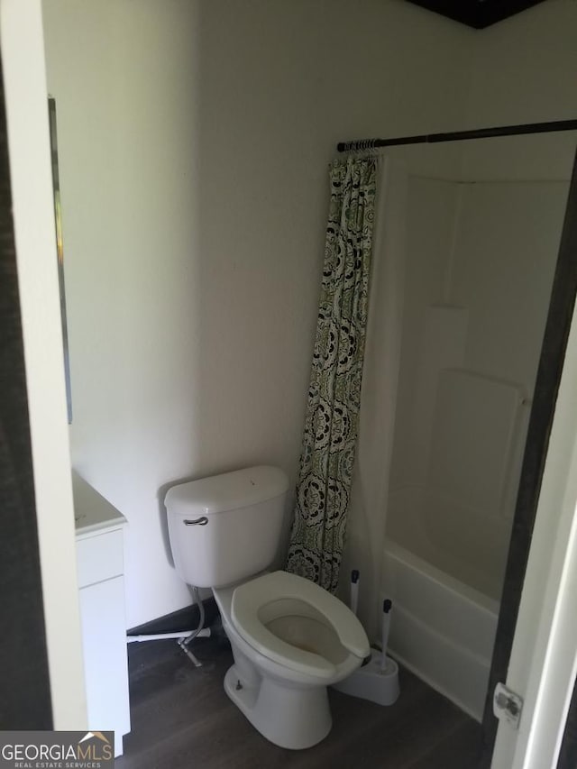 243 Gray Hill Rd, West Point, GA 31833 - bathroom with wood finished floors, shower / bath combo, and vanity