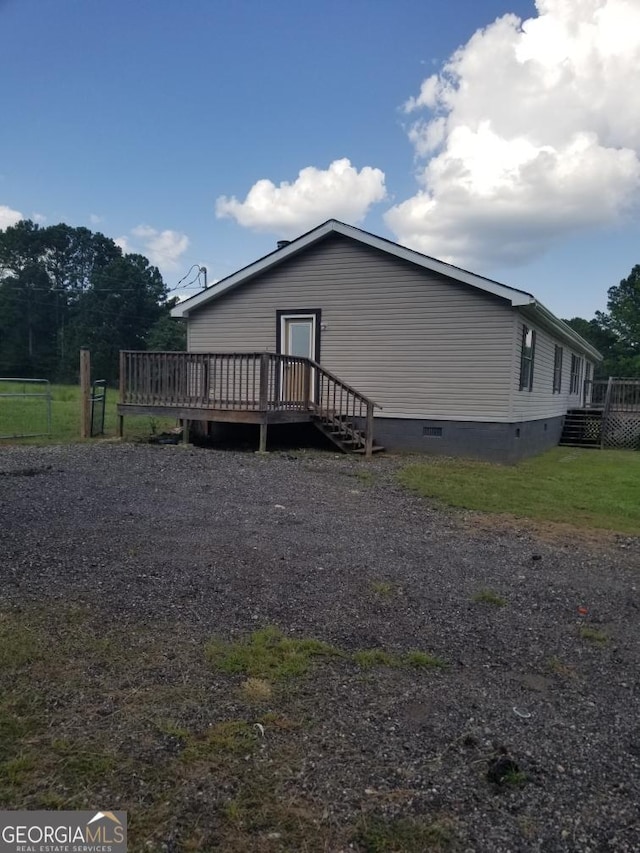 243 Gray Hill Rd, West Point, GA 31833 - view of side of property featuring crawl space and a wooden deck