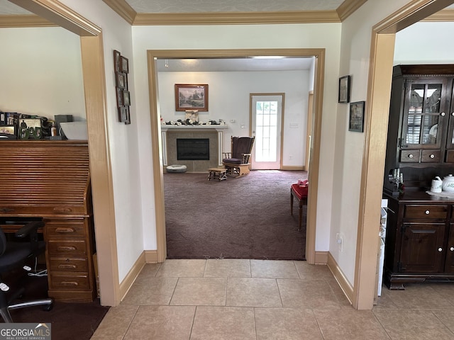 722 Gumlog Rd, Wrightsville, GA 31096 - corridor with light colored carpet, crown molding, an office area, and light tile patterned floors