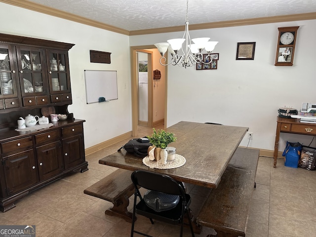 722 Gumlog Rd, Wrightsville, GA 31096 - dining space with a chandelier, tile patterned flooring, and crown molding