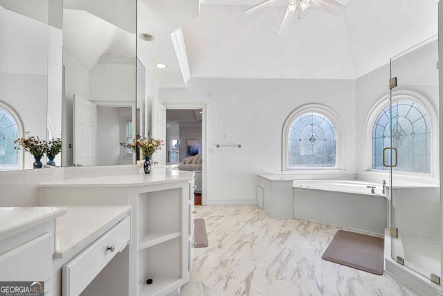 4030 Greatwood Path, Alpharetta, GA 30005 - ensuite bathroom with marble look tile flooring, a garden tub, a shower stall, ceiling fan, and a high ceiling