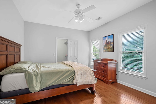 4030 Greatwood Path, Alpharetta, GA 30005 - bedroom with light wood-type flooring and ceiling fan