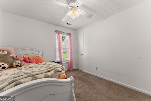 625 Hickory Nobb, Sugar Hill, GA 30518 - bedroom with light carpet, ceiling fan, and a textured ceiling