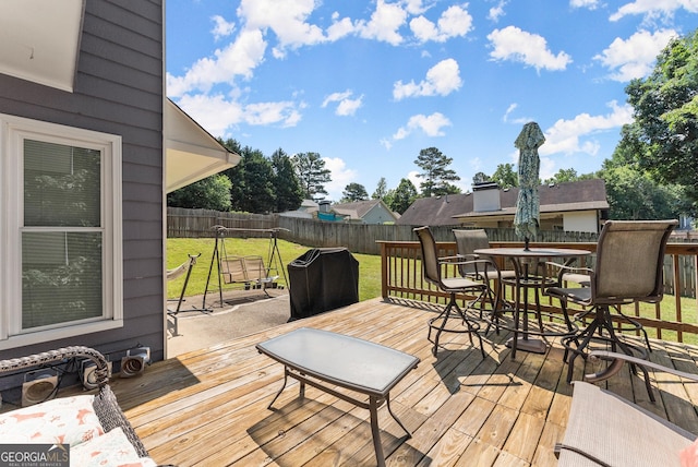 625 Hickory Nobb, Sugar Hill, GA 30518 - wooden terrace featuring outdoor dining area and a fenced backyard