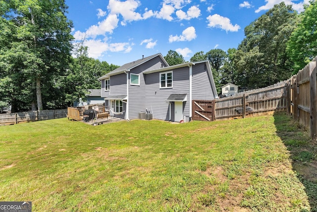 625 Hickory Nobb, Sugar Hill, GA 30518 - back of house with a fenced backyard and a wooden deck